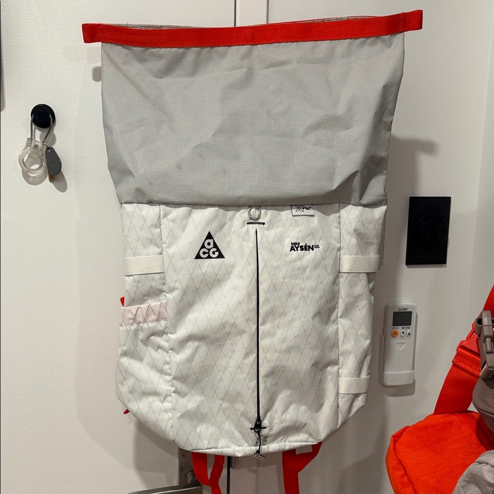 Nike ACG White and Gray Roll-Top Backpack with Red Straps